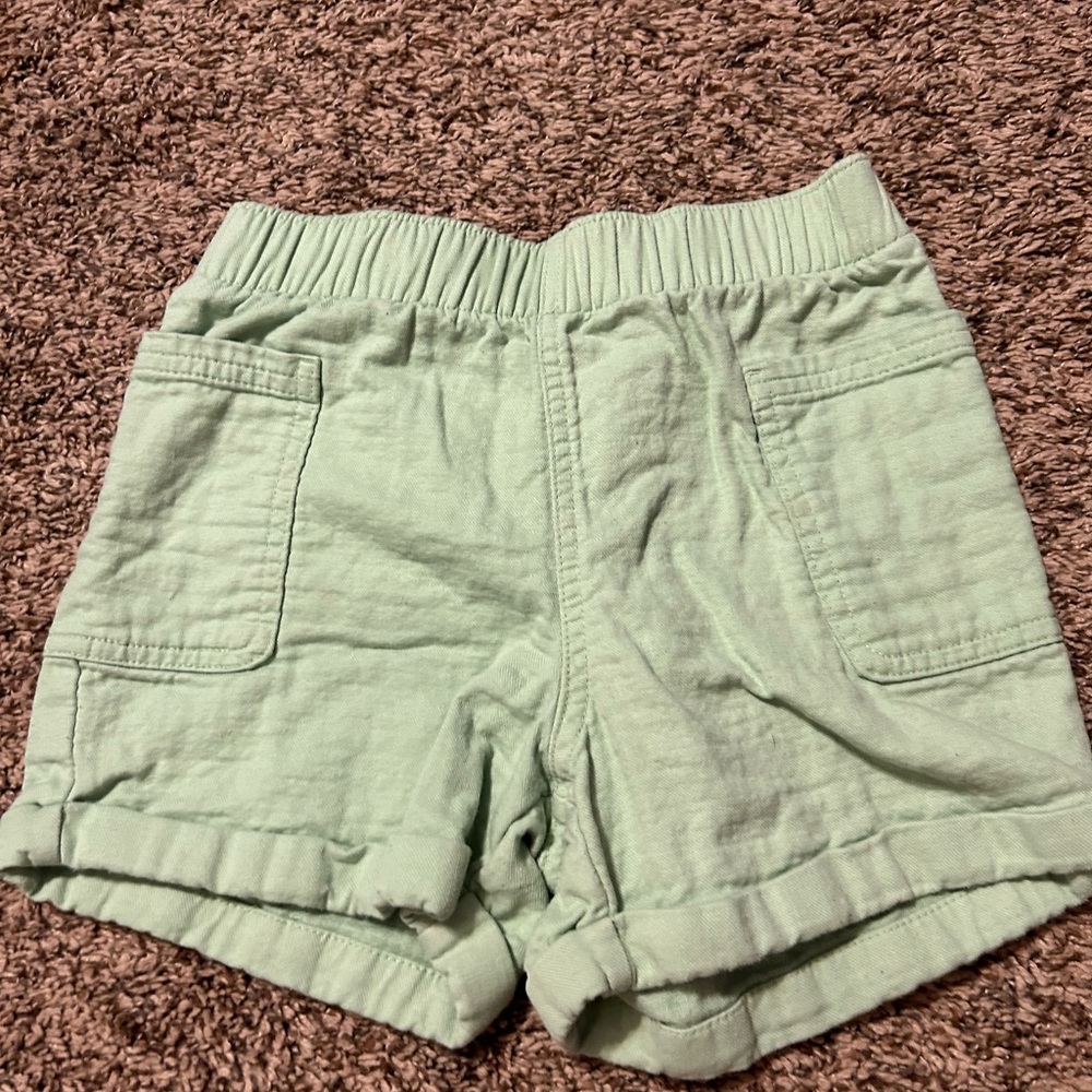 Girl green shorts size 8